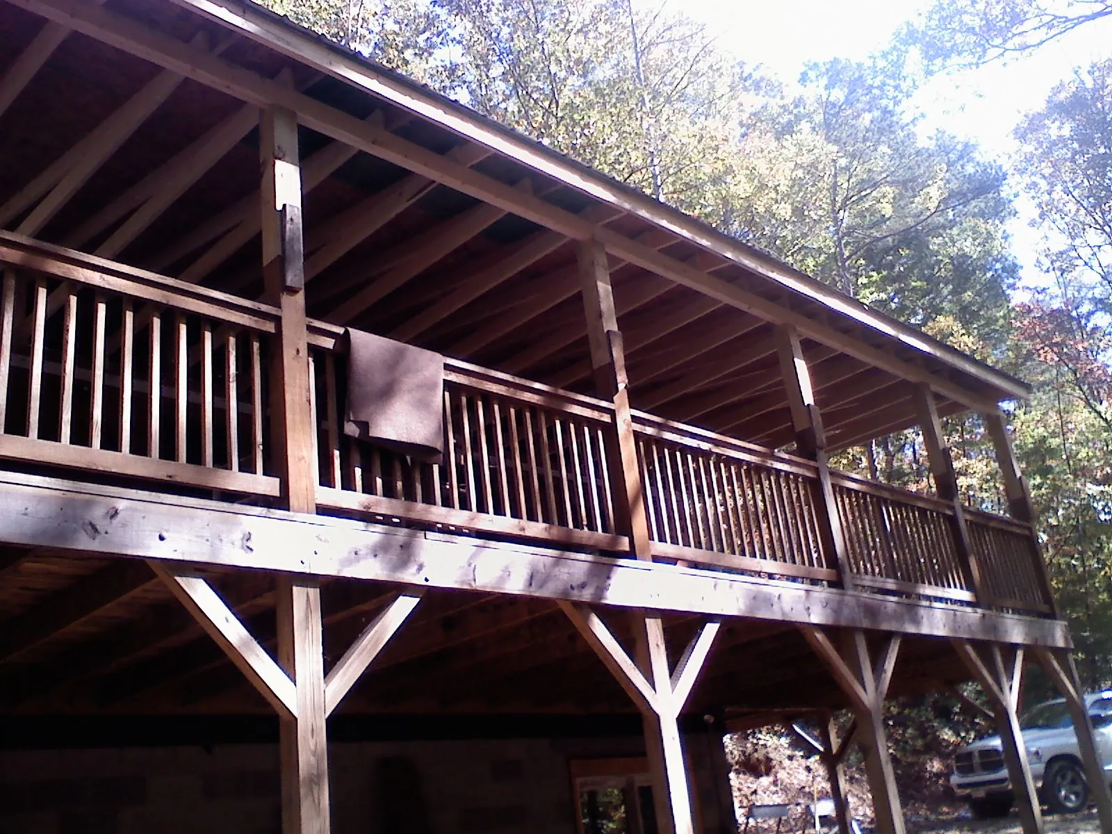 Timber framing under a new elevated porch and deck — Roof Leak Repair in Mexico by Roofing Brothers